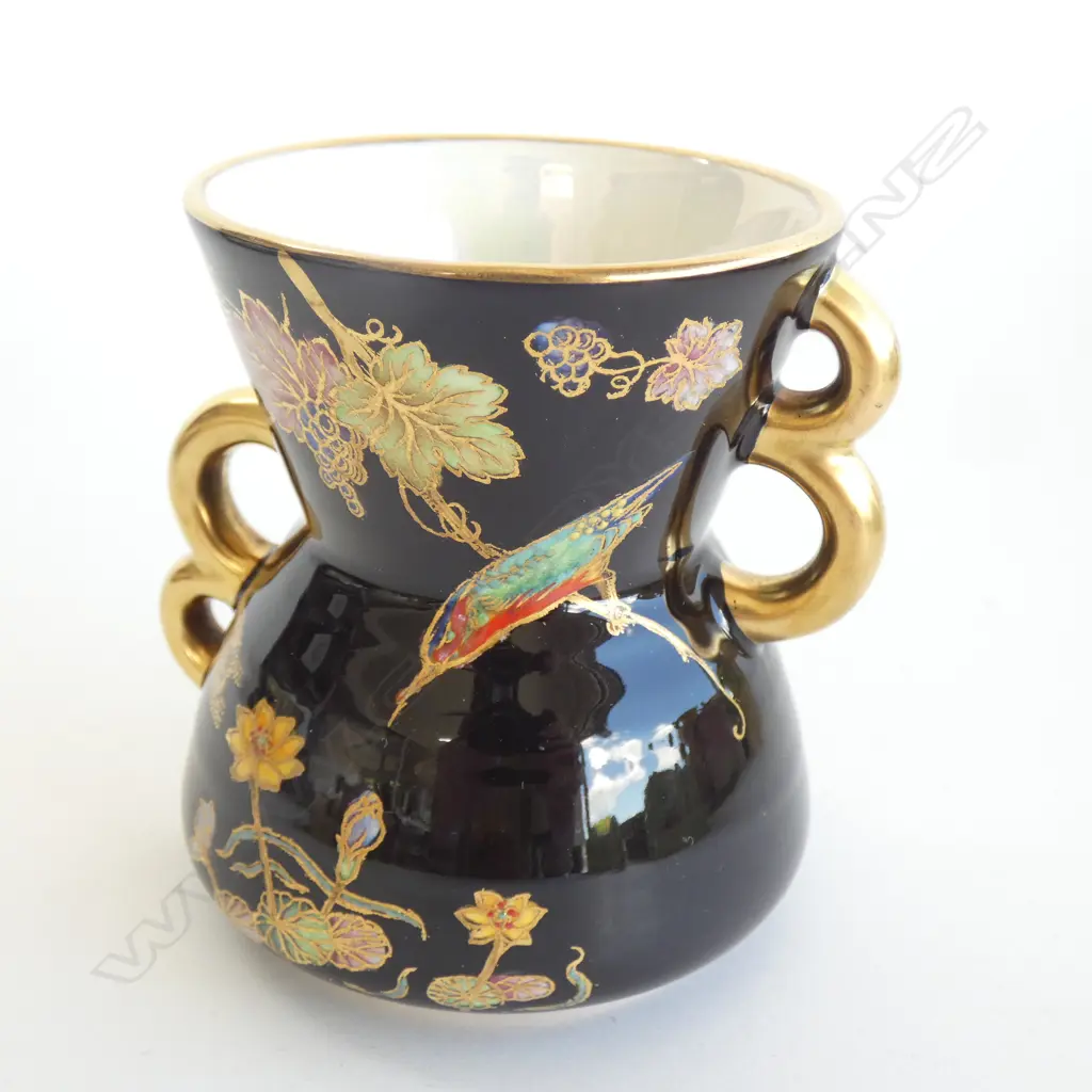 A Carlton ware enamelled vase, kingfisher and water lily on black ground Image 1++